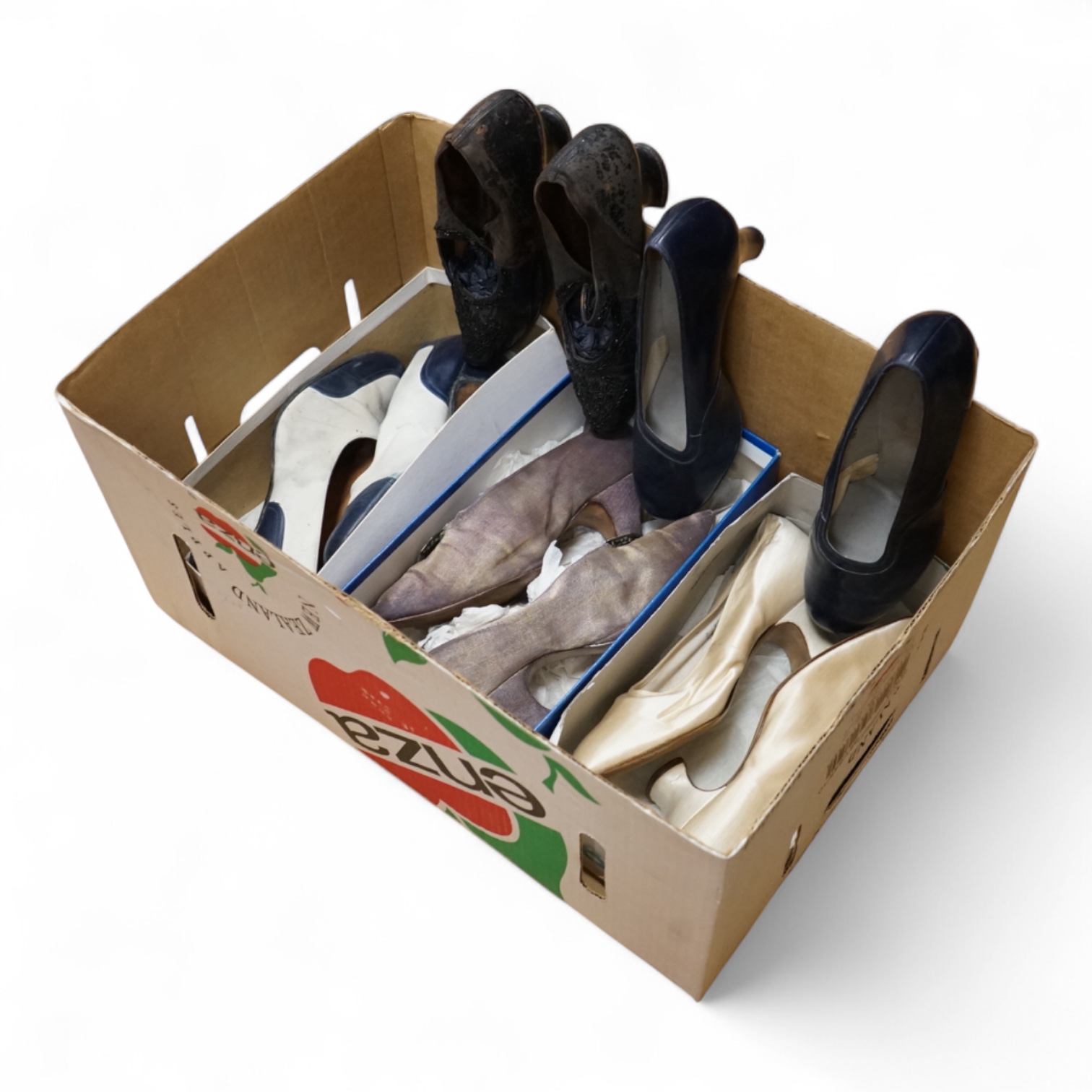 Five pairs of ladies shoes from 1900-1940's; a pair black leather and jet shoes, a pair of cream silk wedding shoes, lilac evening shoes, a pair of two tone leather shoes and a similar navy pair